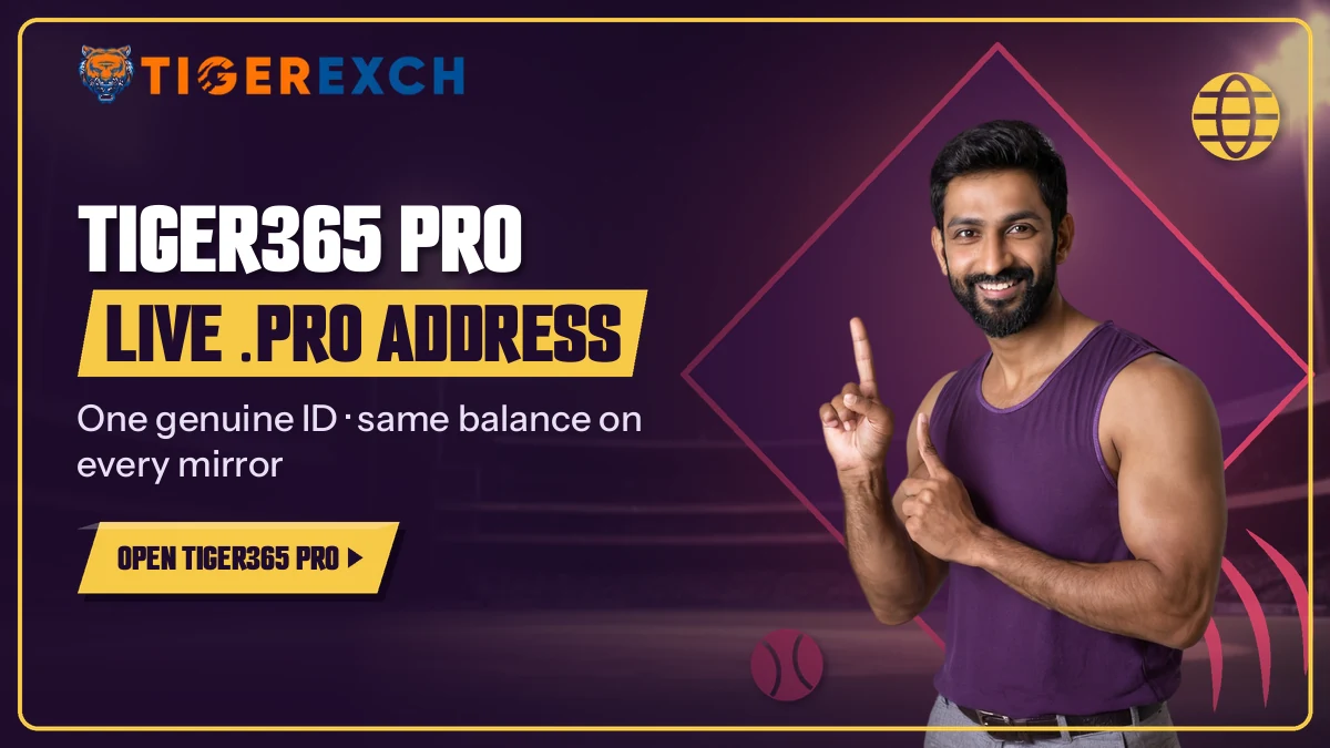 Man in a purple vest pointing at the live tiger365.pro address banner