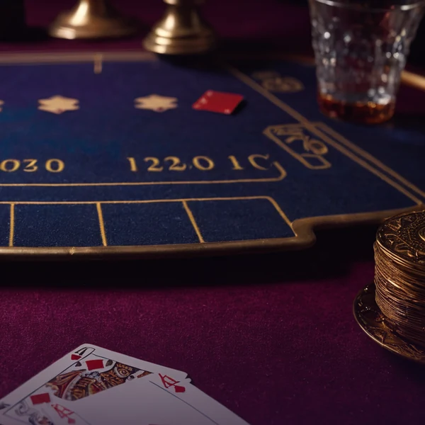 Andar Bahar cards dealt on two sides of a joker card